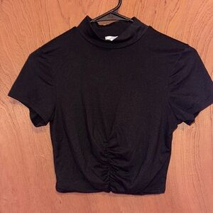 Cropped sinched t shirt with a slight turtle neck